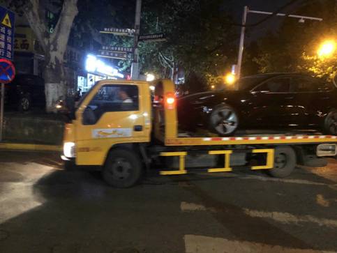 提車,拒交門,特斯拉,多多,車主,后續(xù) 特斯拉“拒交門”后續(xù)：拼多多協(xié)助武漢車主成功提車